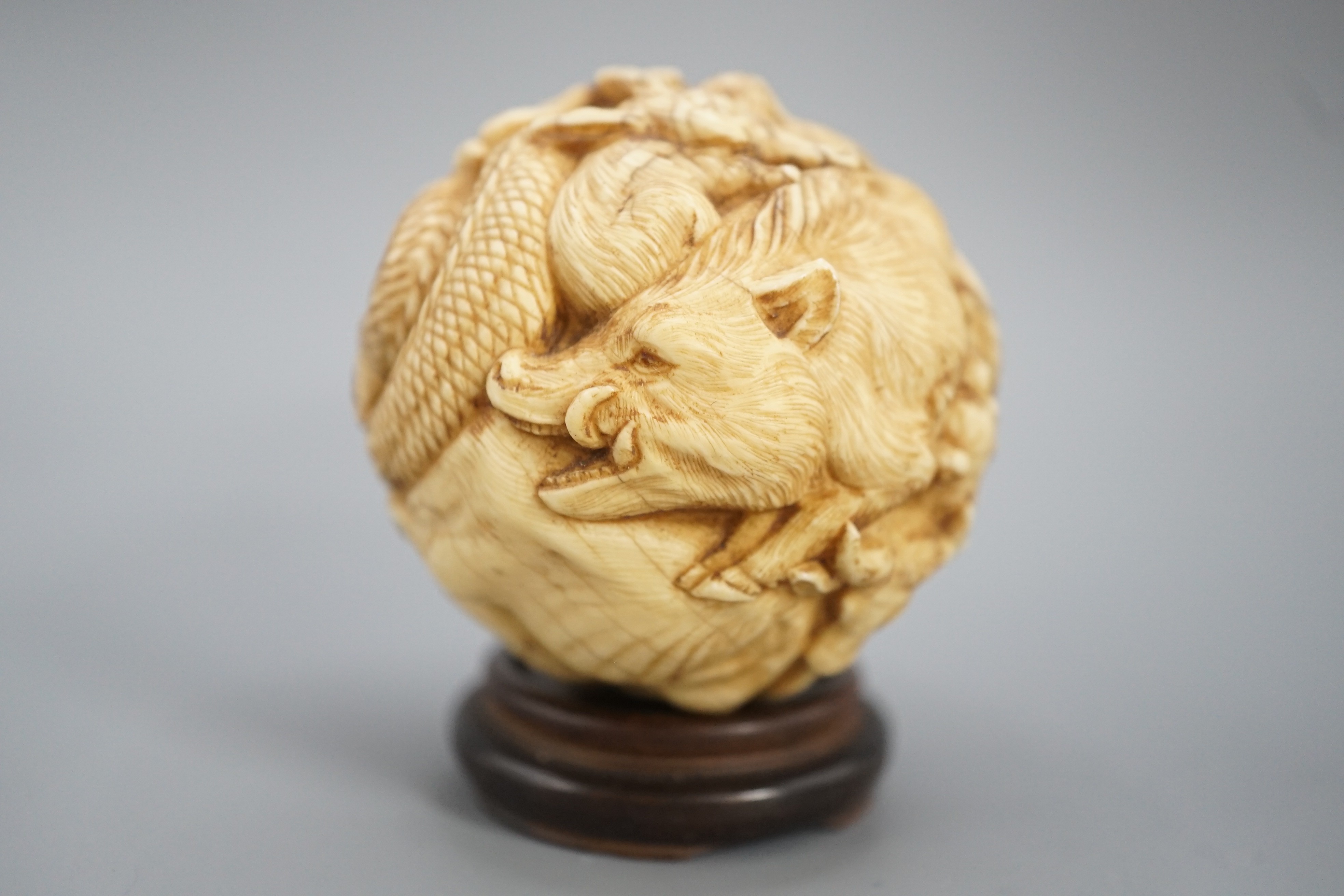 A Japanese ivory ‘Zodiac animal’ ball, early 20th century, 5cm